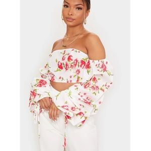 PrettyLittleThing off-shoulder ruched sleeve floral crop top